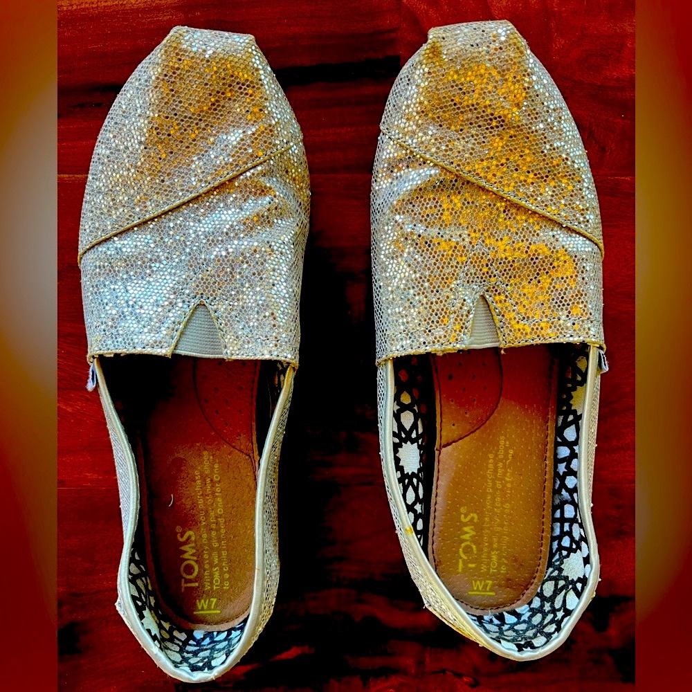 Women’s silver glitter Toms size 7